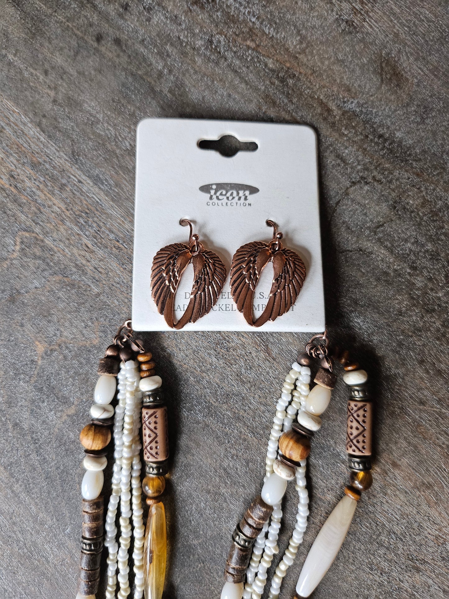 Angel wings beaded necklace with matching earrings.