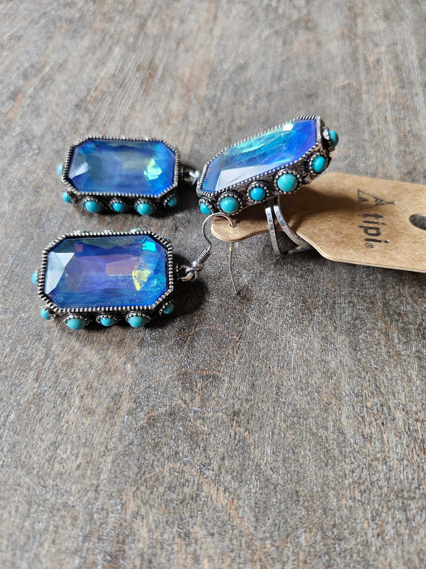 Blue iridescent stone and turquoise ring with matching earrings.
