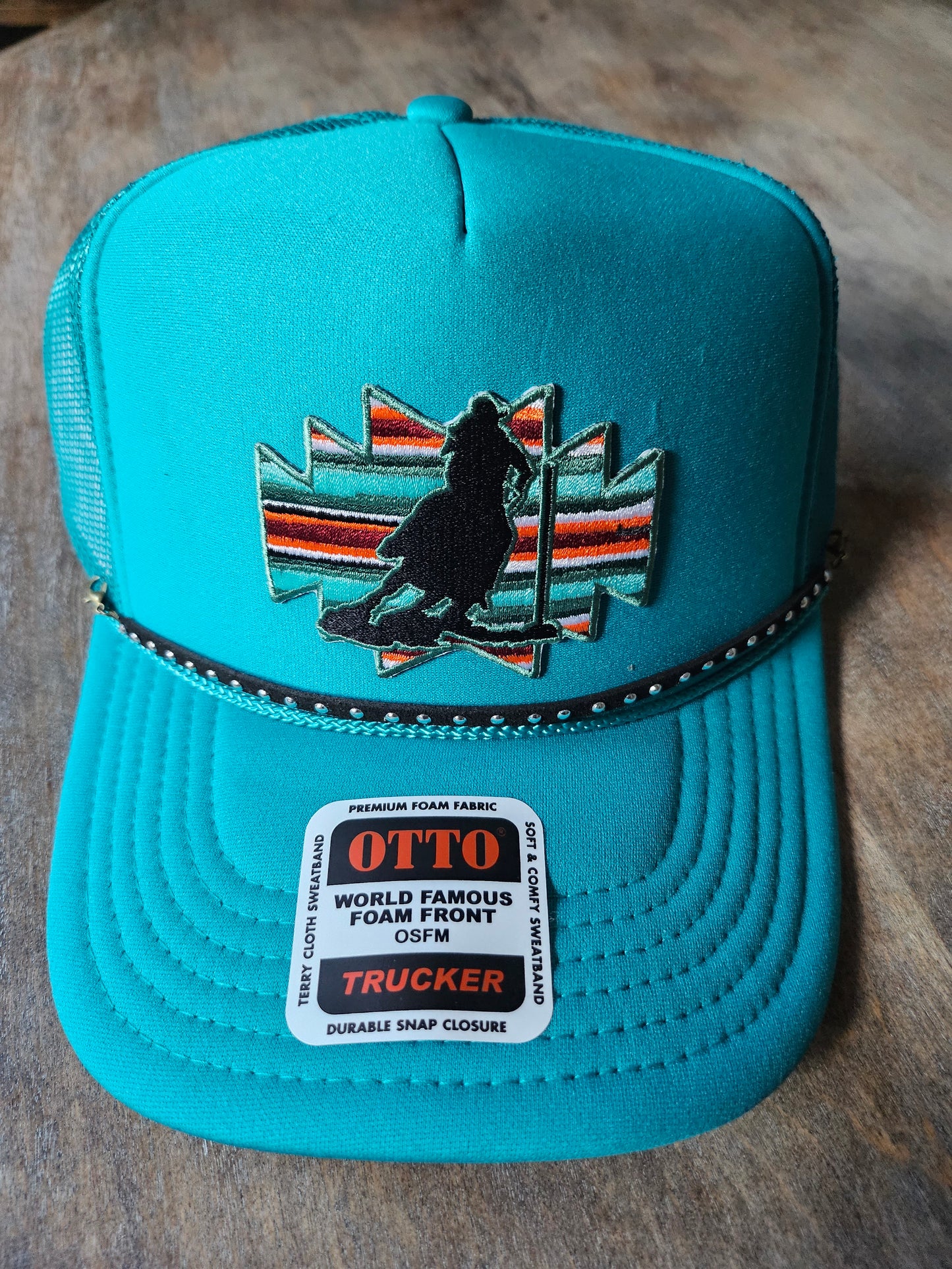 Custom trucker hats with pole bending rodeo patches