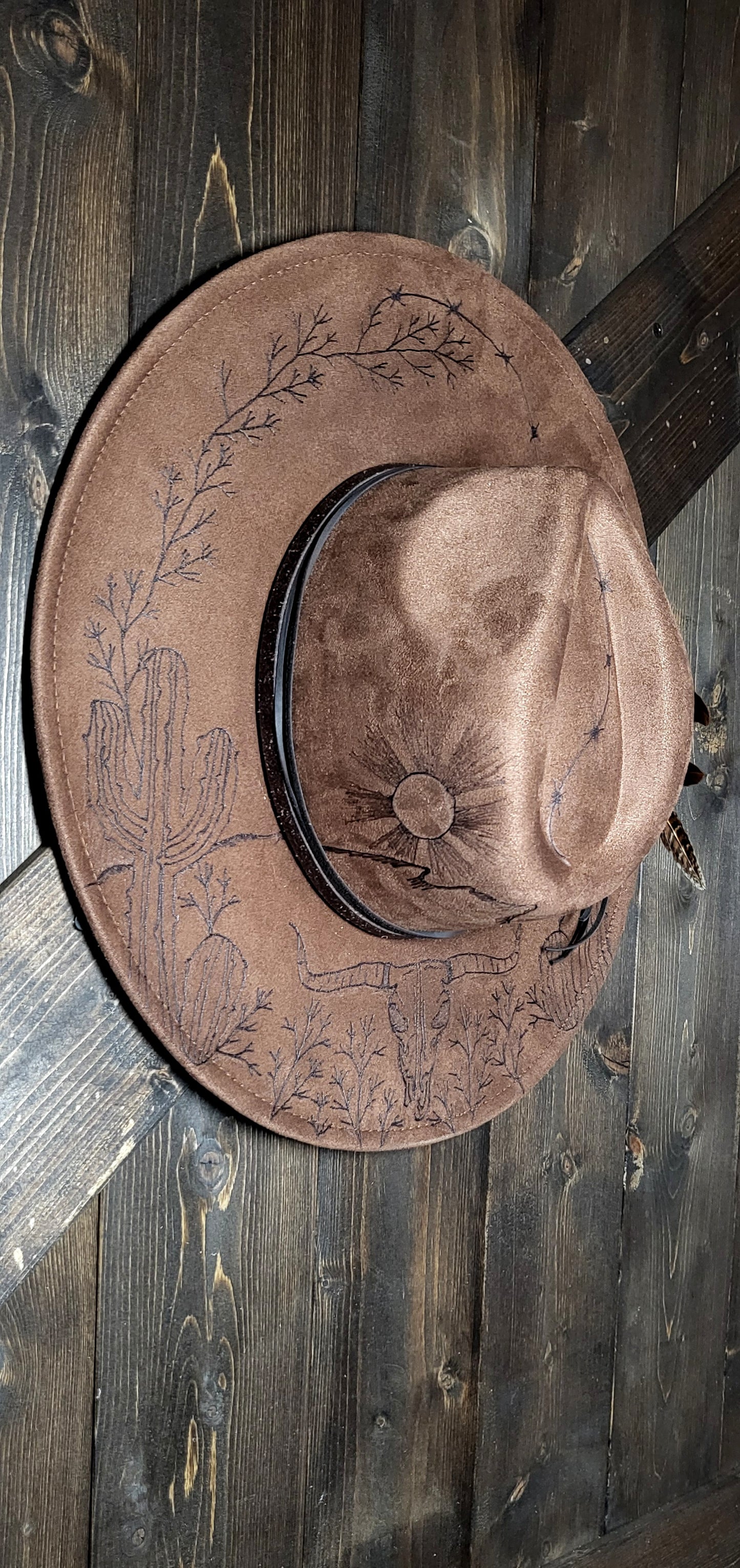 Introducing "Miranda" our desert sun scape suede fedora hat. Hand is burned on top and under her brim, fully adjustable