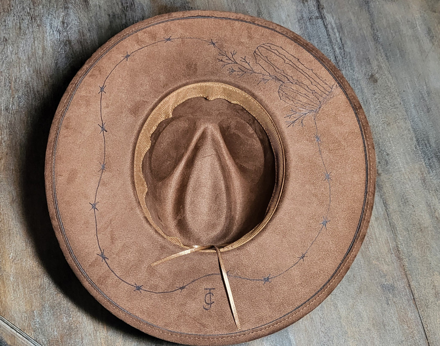 Introducing "Miranda" our desert sun scape suede fedora hat. Hand is burned on top and under her brim, fully adjustable