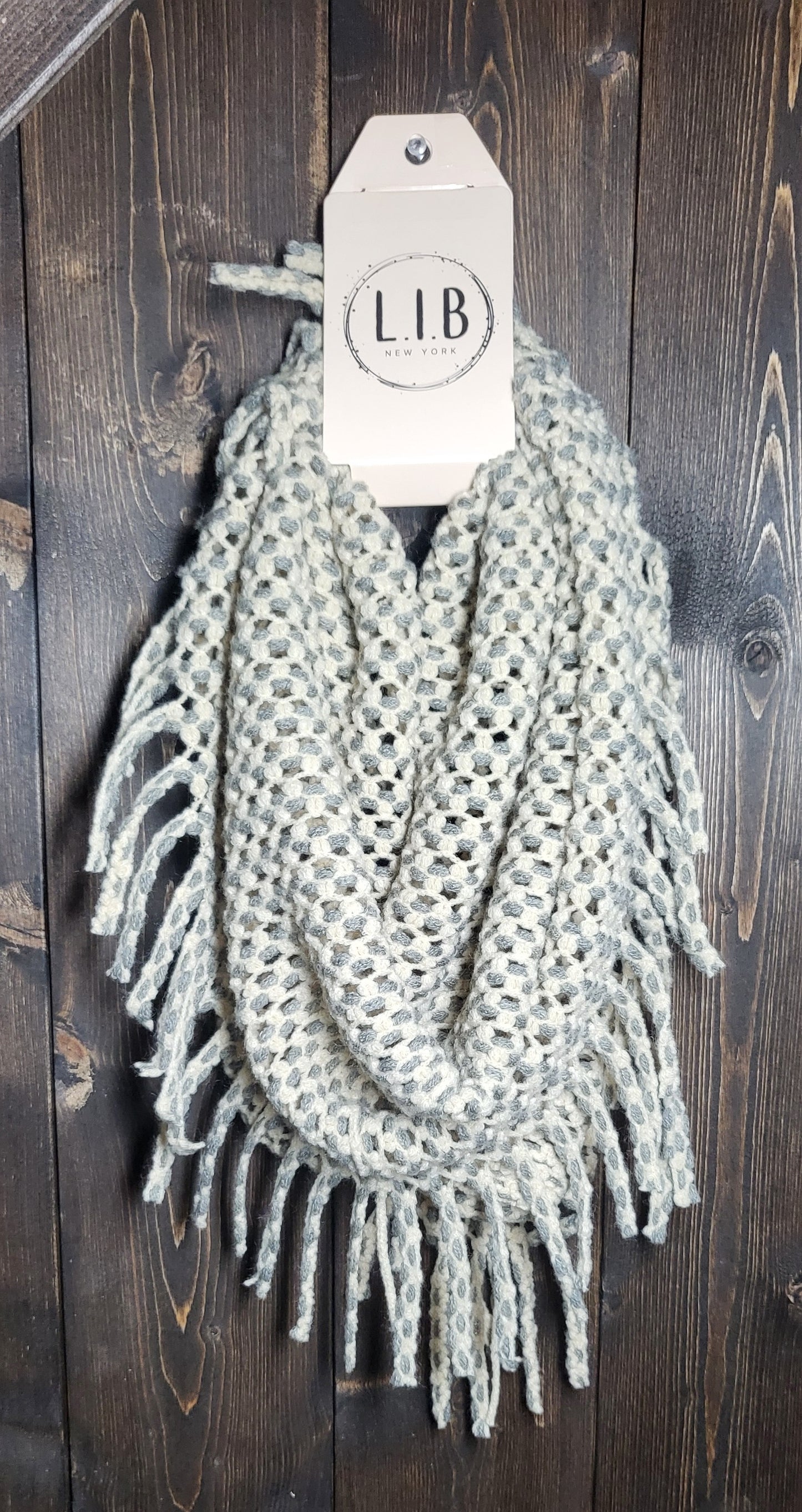 Soft fringed cowl scarves with a western flare