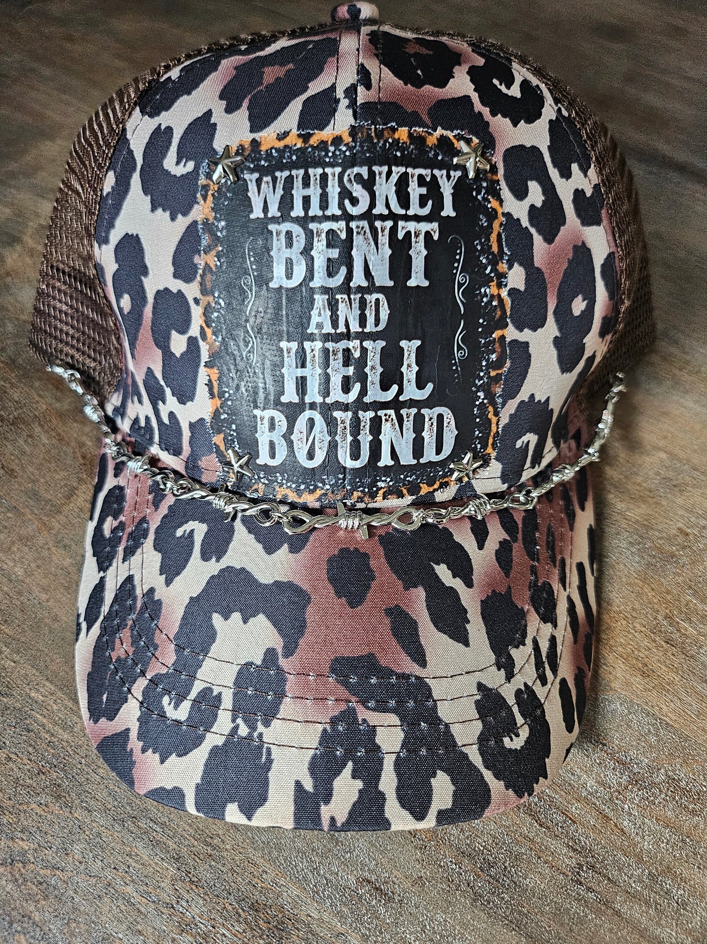 Custom leopard print "whiskey bent and hell bound" trucker pont tail hat with barbed wire hat band