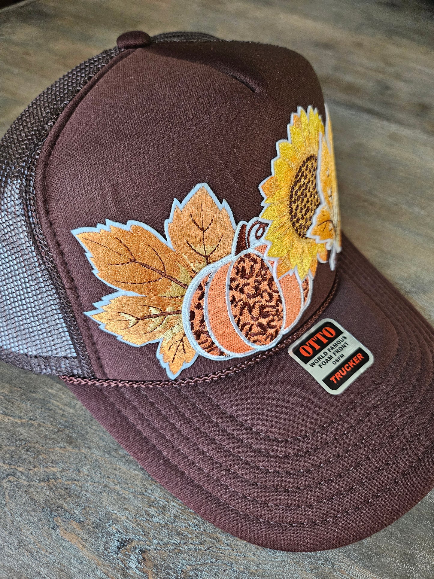 Trucker hat custom with fall leaves and sunflower embroidered patches