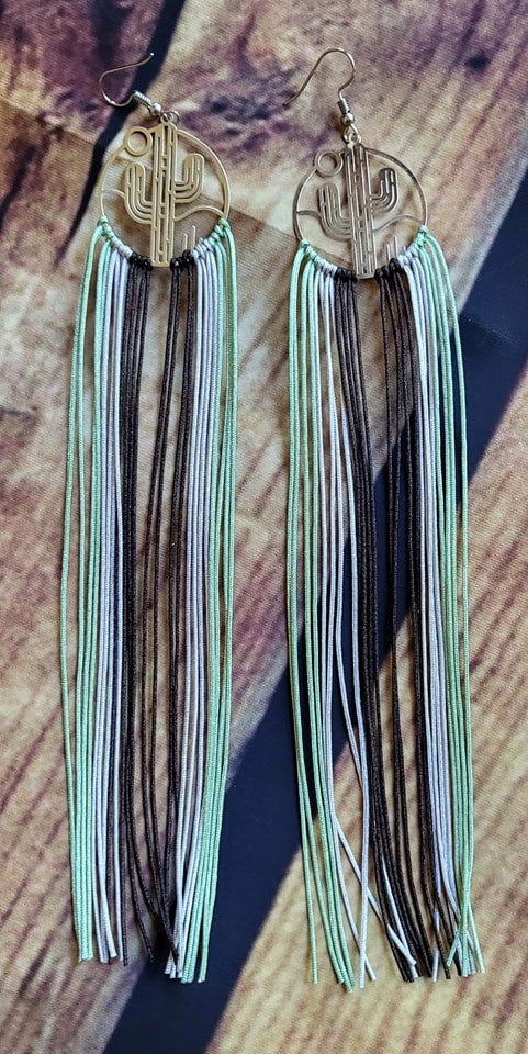 Super cute country girl, Silver Cactus filigree cutout earrings with green grey and brown fringe tassels.