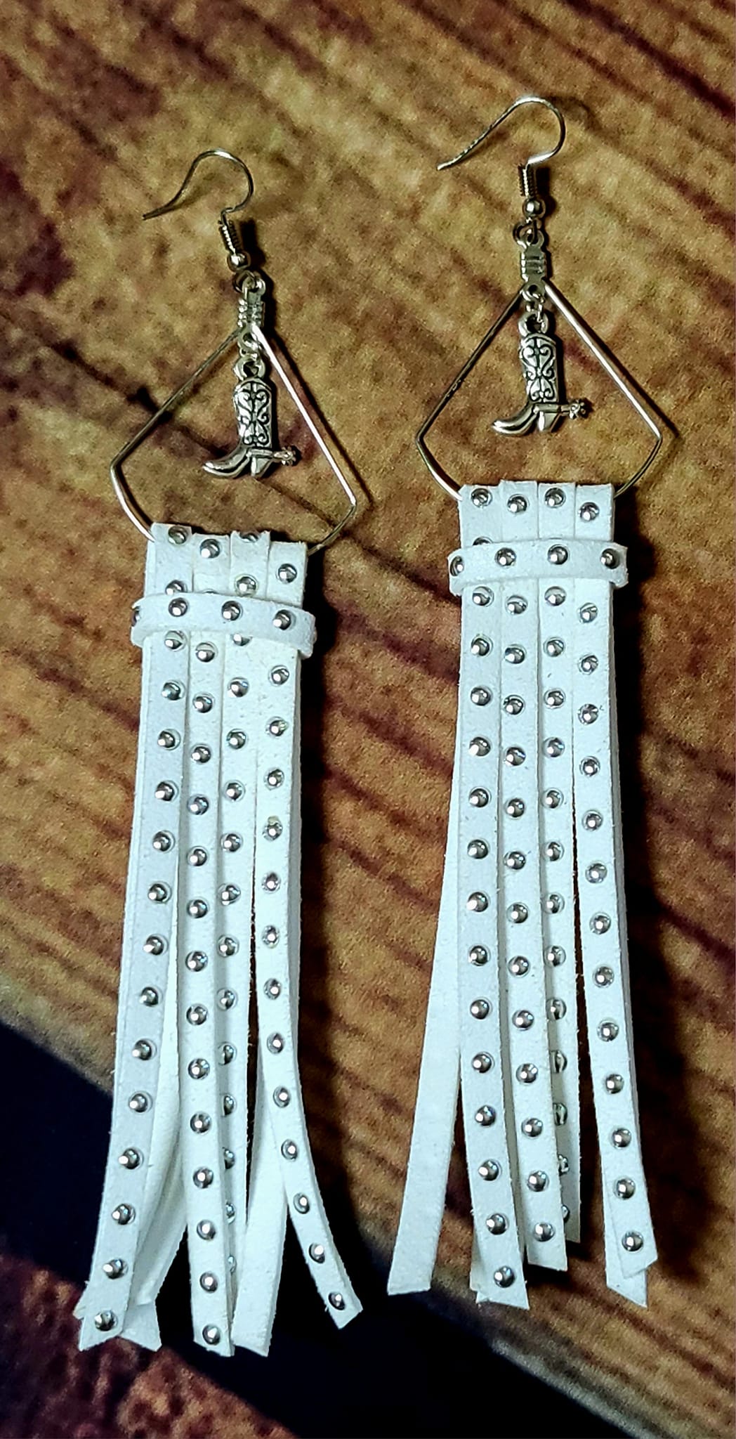 White faux leather studded fringe tassel earrings with silver cowboy boots