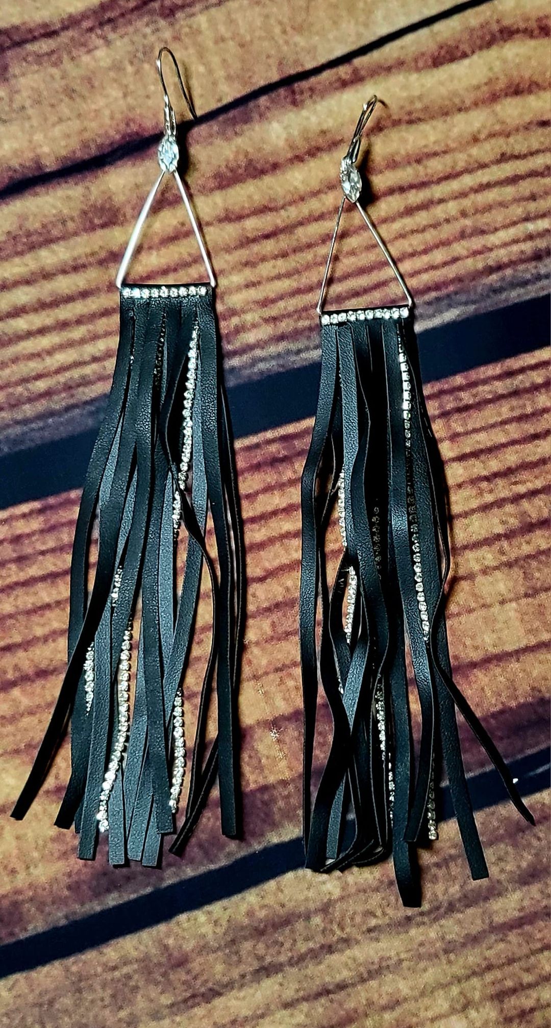 Gorgeous faux leather fringe tassel earrings accented with rhinestones