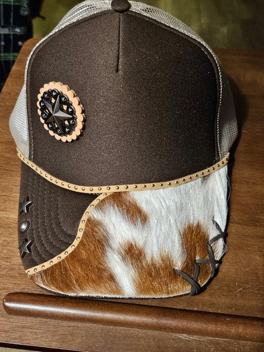 Western trucker hat with cowhide and conchos