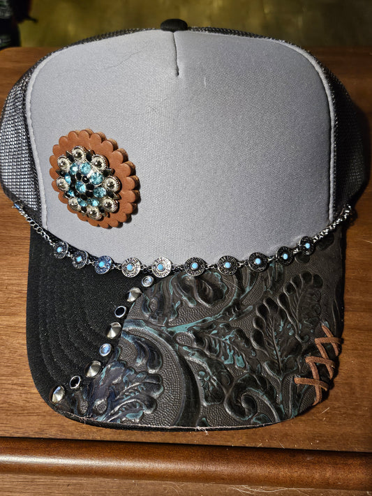 Western trucker hat with cowhide and conchos