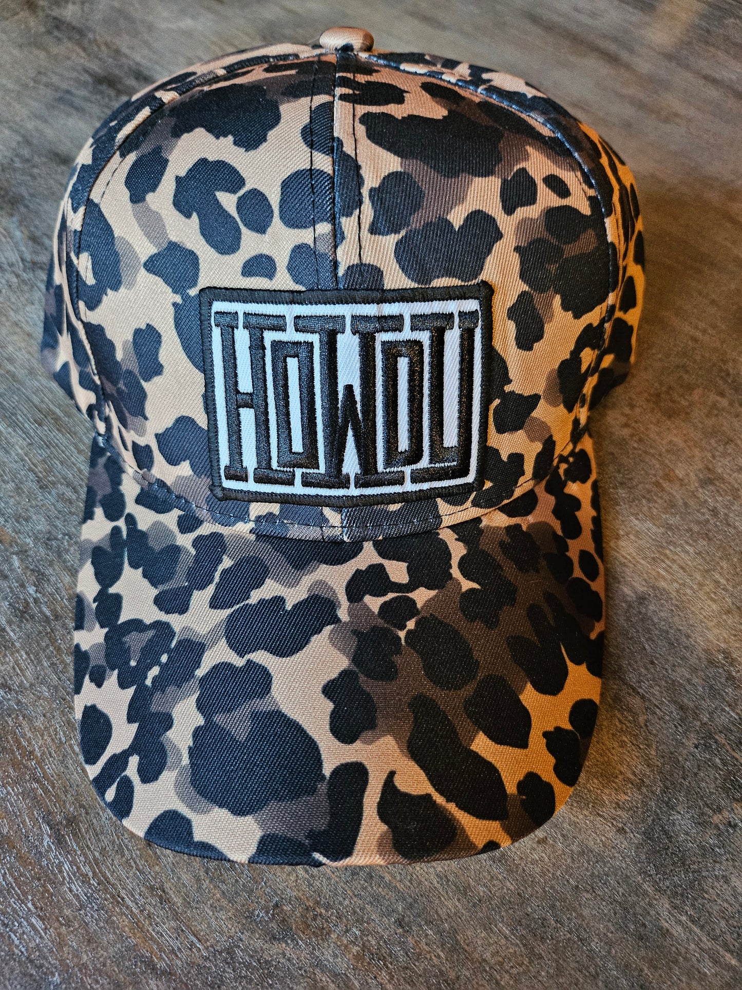 Custom leopard print "Howdy" embroidered patch trucker hat