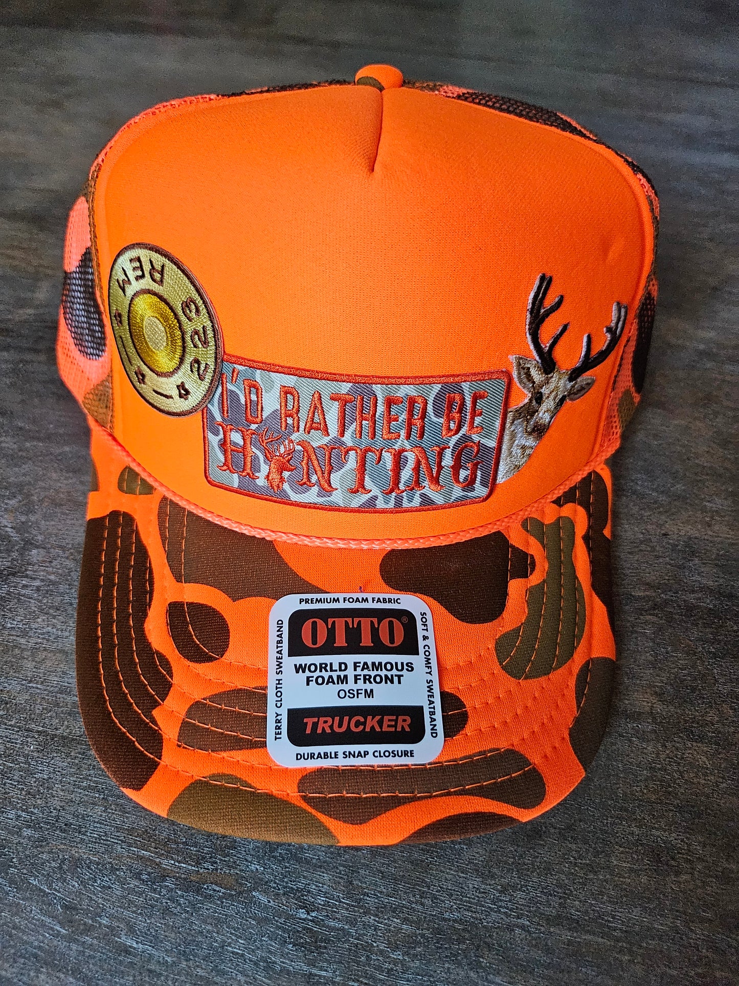 Neon orange camo trucker hat