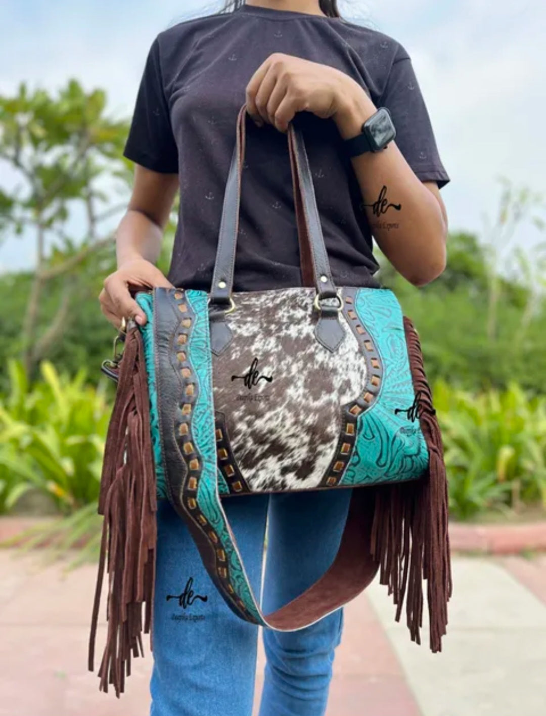 western embossed turquoise, and hair on cowhide leather and suede purse fringe, and both crossbody and handbag straps