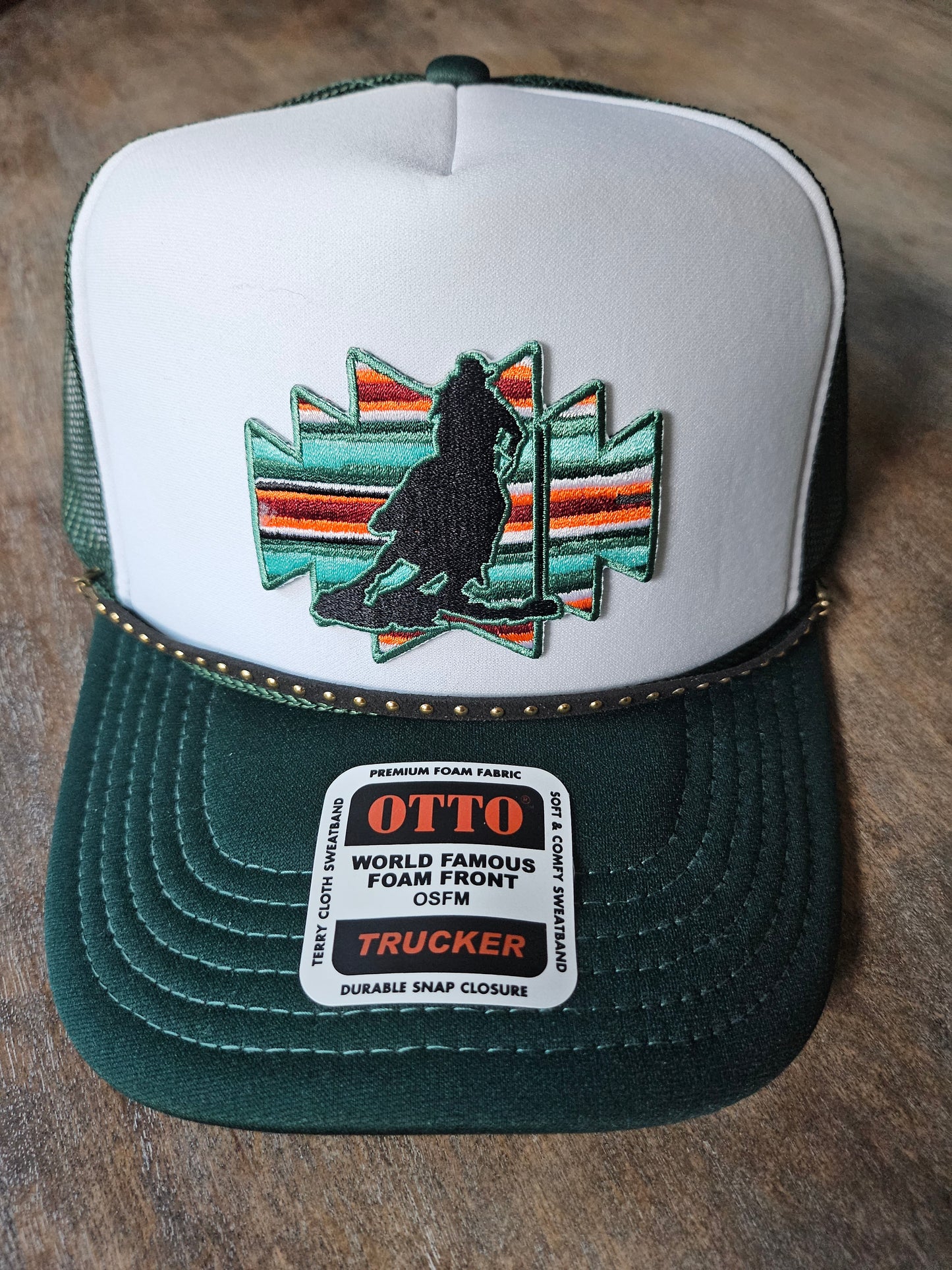 Custom trucker hats with pole bending rodeo patches