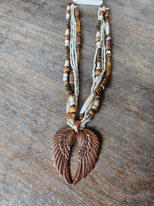 Angel wings beaded necklace with matching earrings.