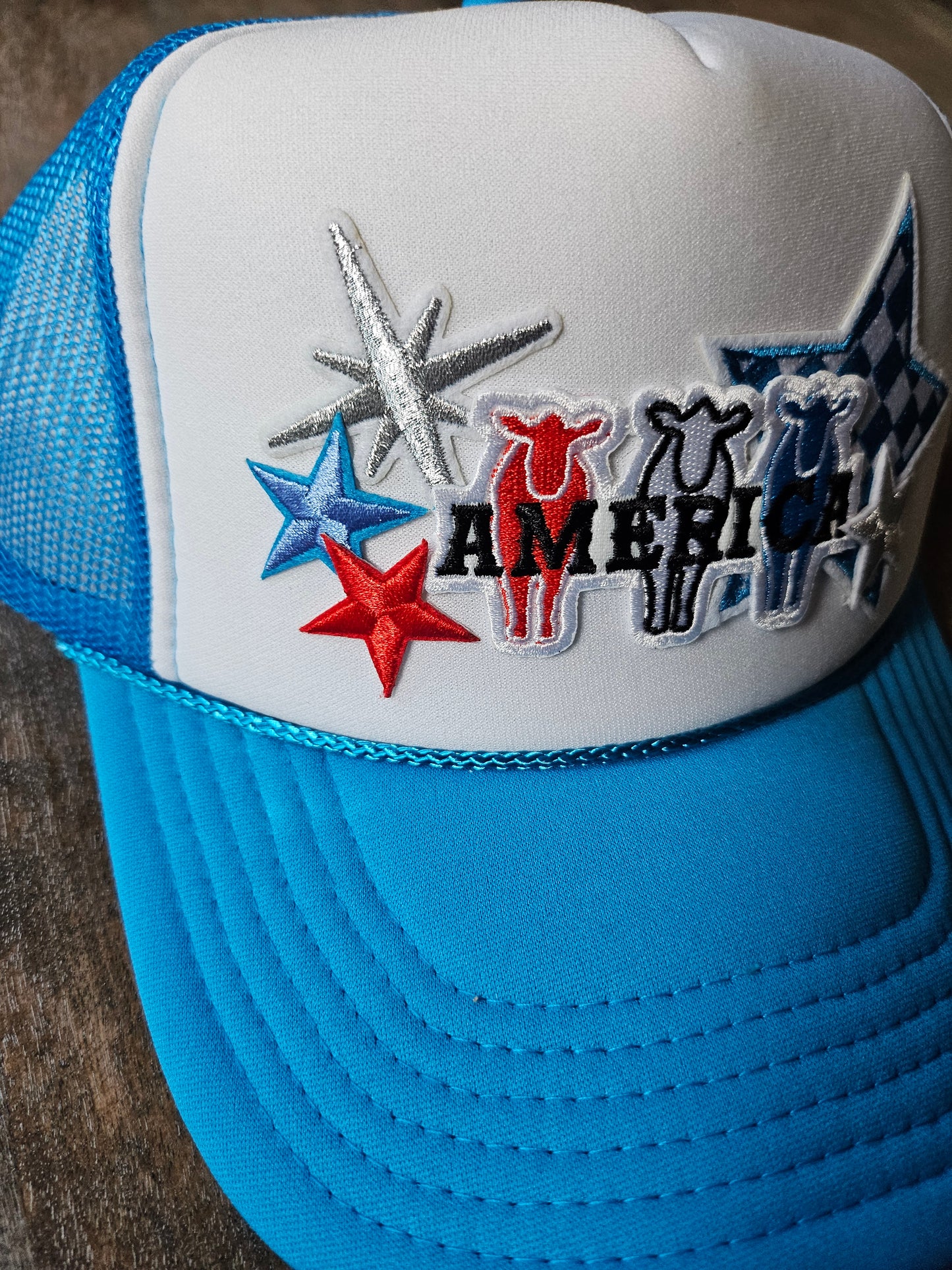 Red, white, and blue trucker hats