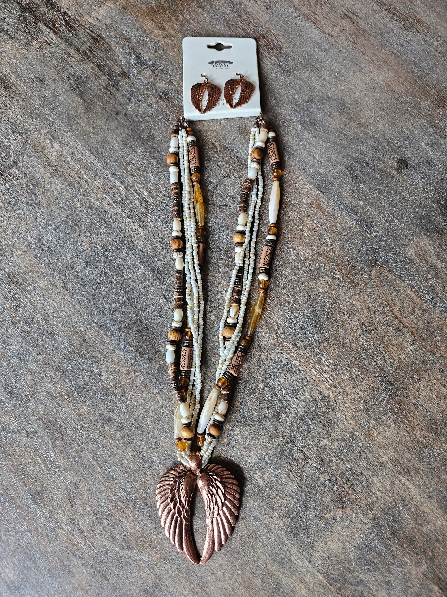 Angel wings beaded necklace with matching earrings.