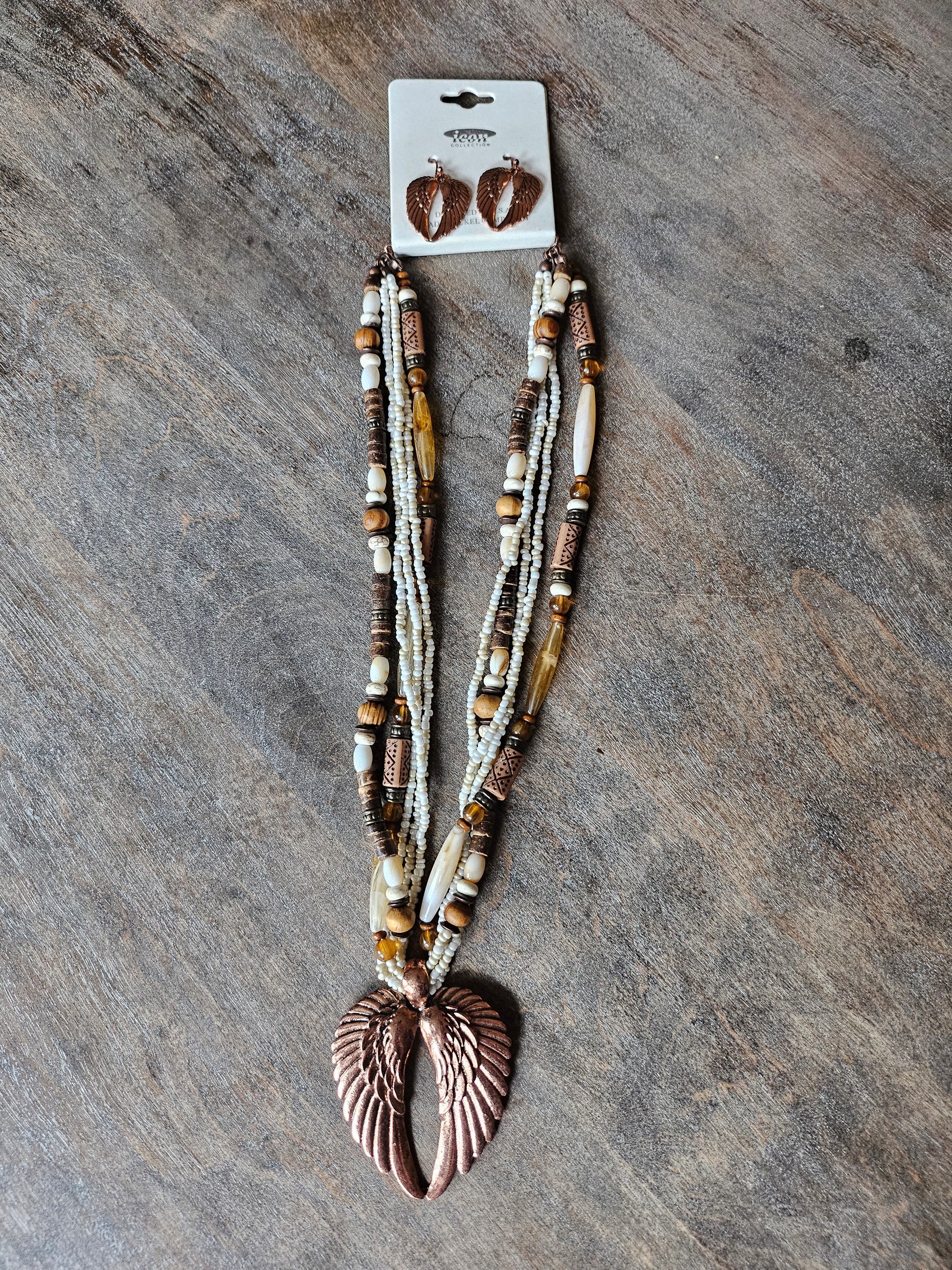 Angel wings beaded necklace with matching earrings.
