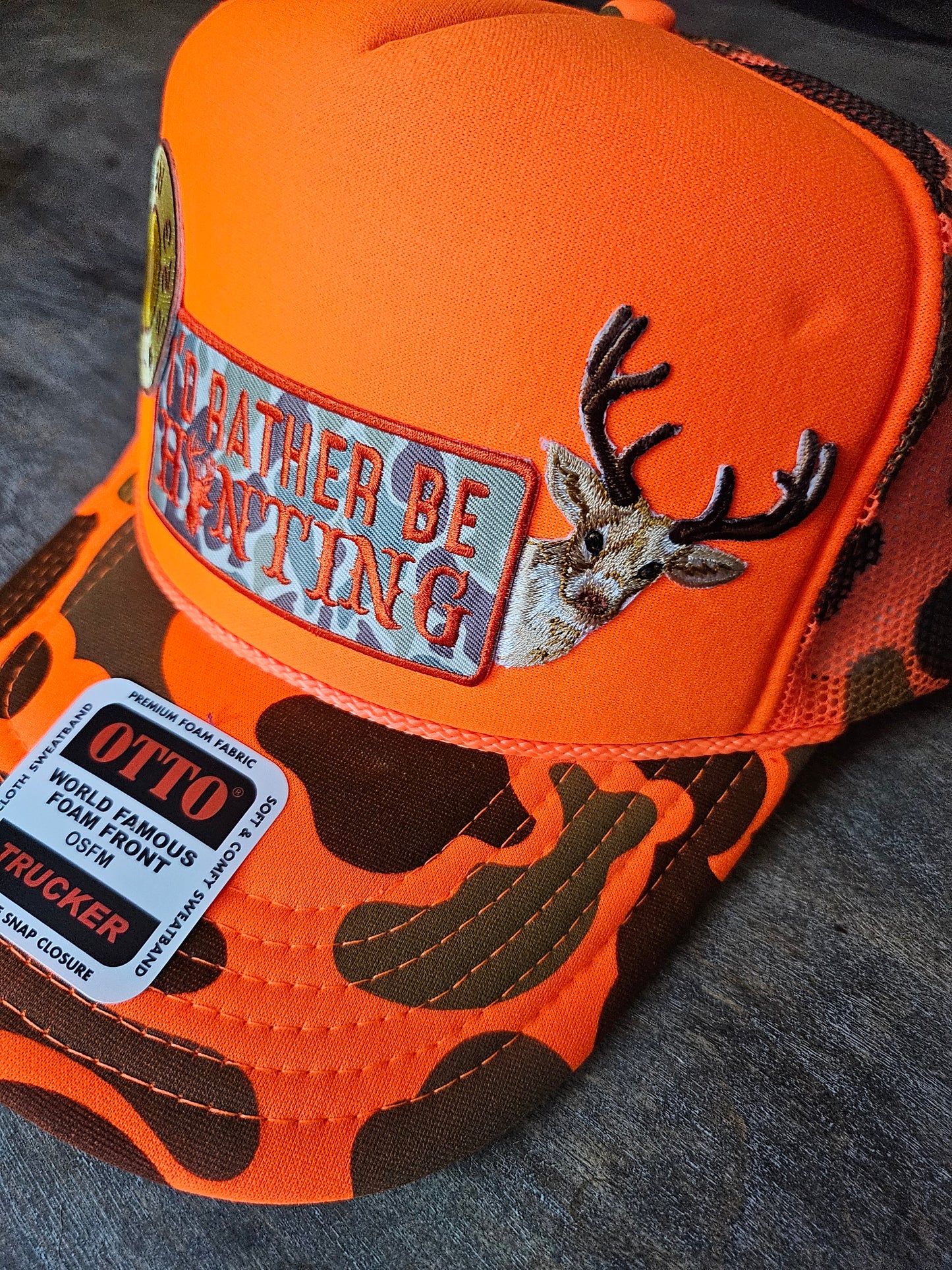 Neon orange camo trucker hat